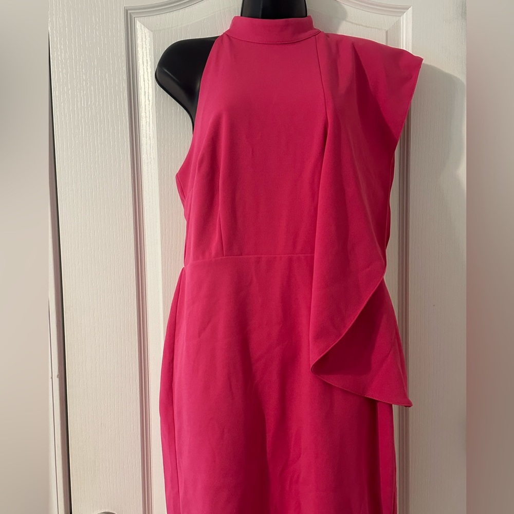Pink ruffled dress.